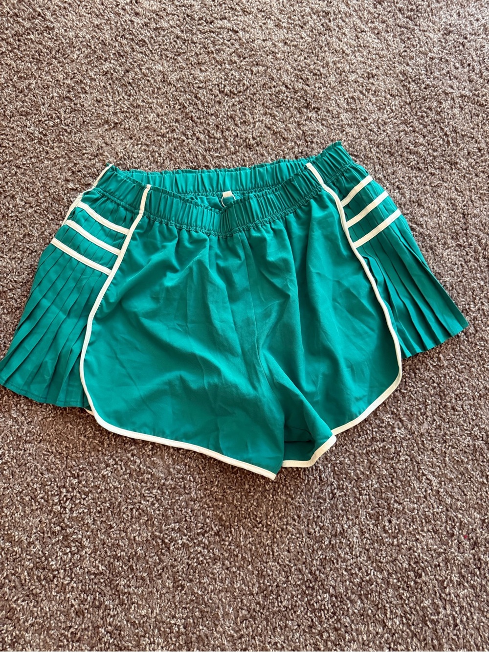 Teal pleated running shorts